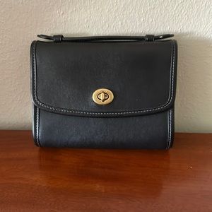 From the Coach Originals Collection, Kip Turnlock Crossbody